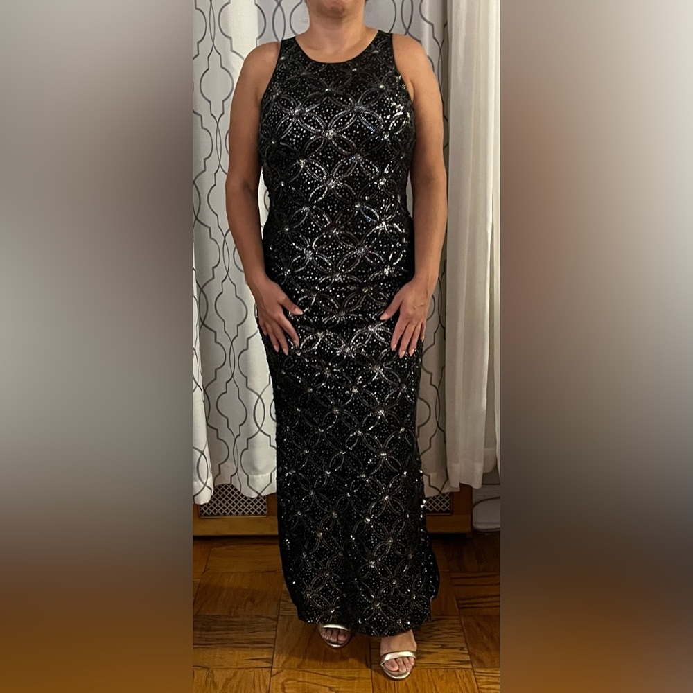 Elegant embroidery motifs on this shimmering gown